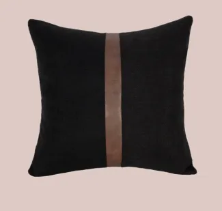 black cushion with tan leather stripe- blush background